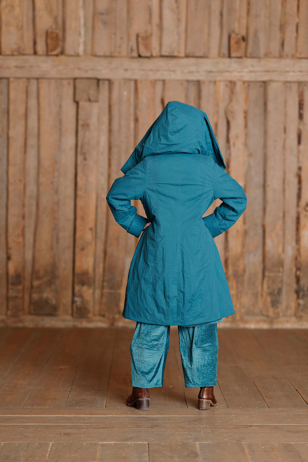 Petrol coat with asymmetric zipper