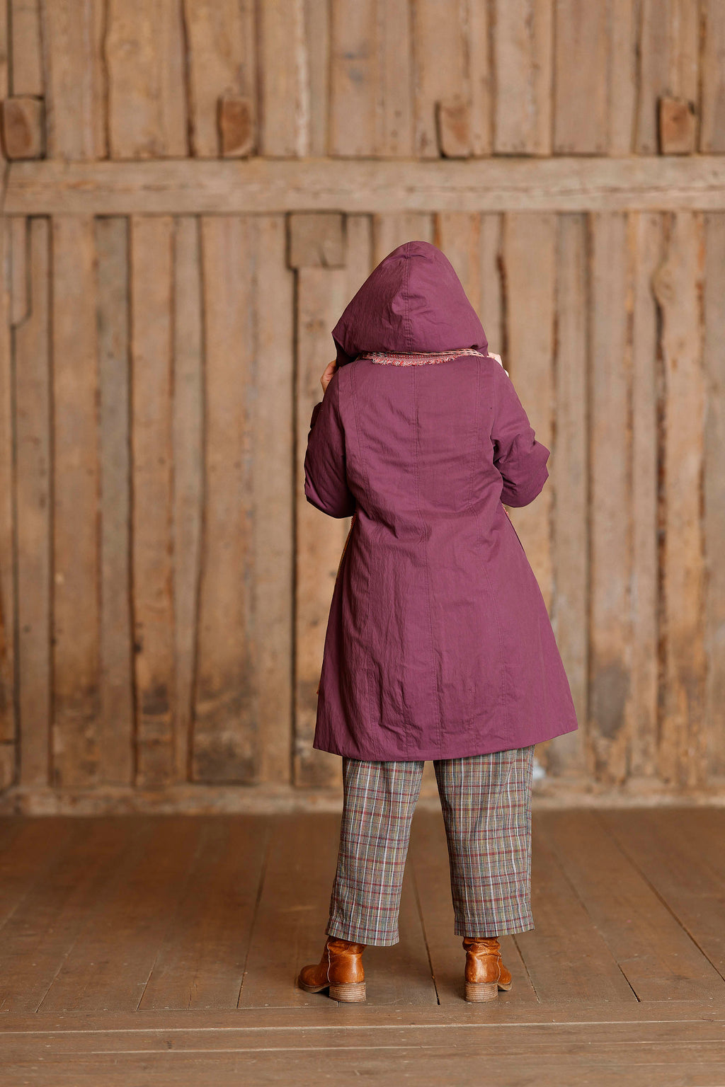 Plum coat with asymmetric zipper