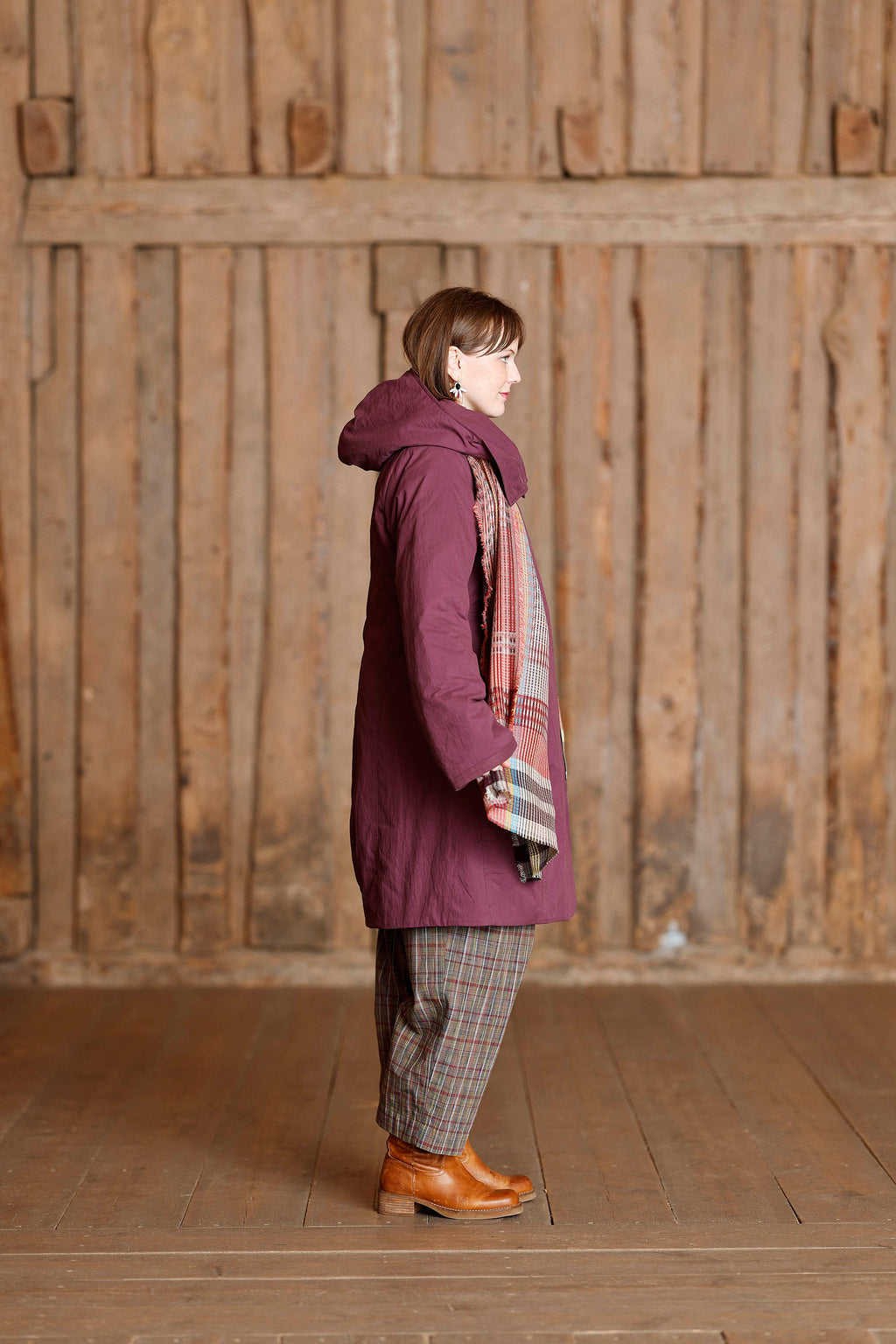 Plum coat with asymmetric zipper