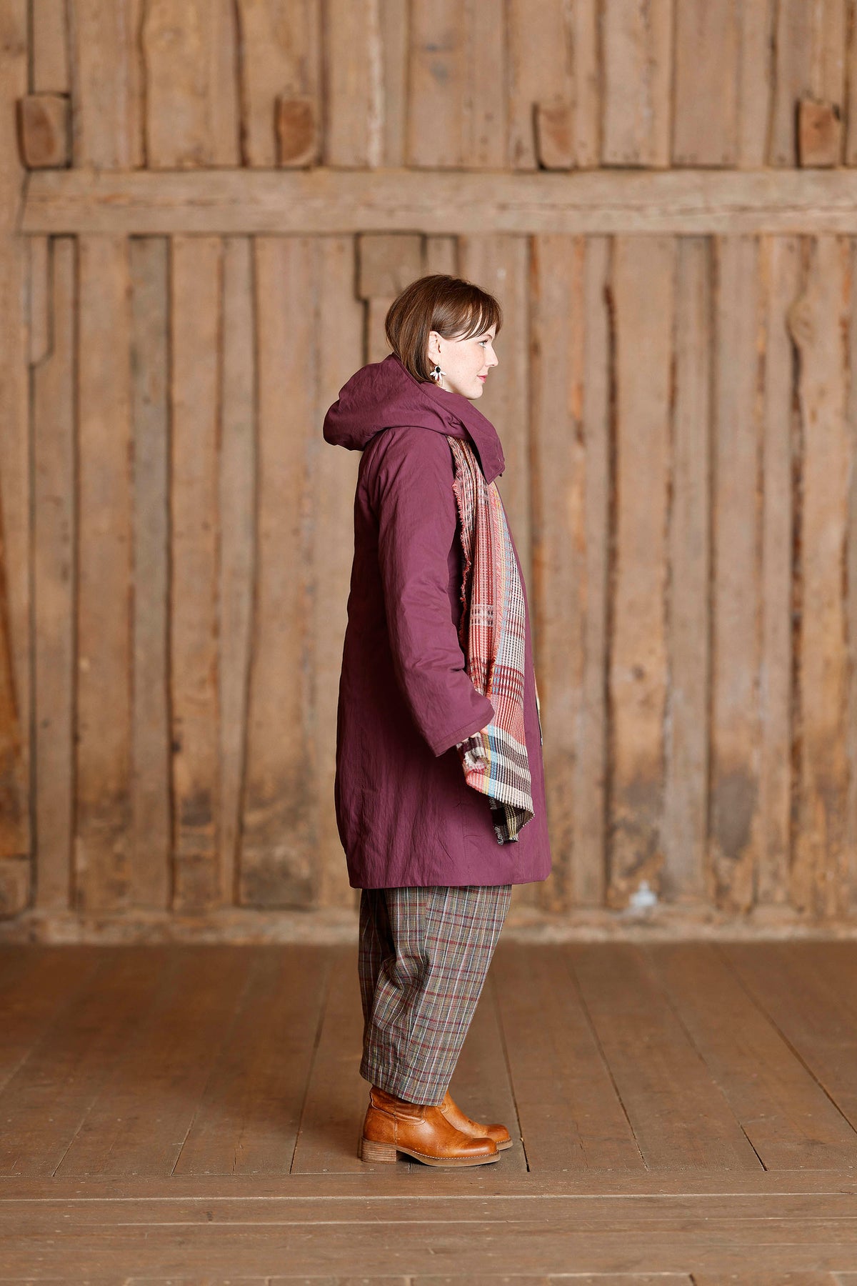 Plum coat with asymmetric zipper