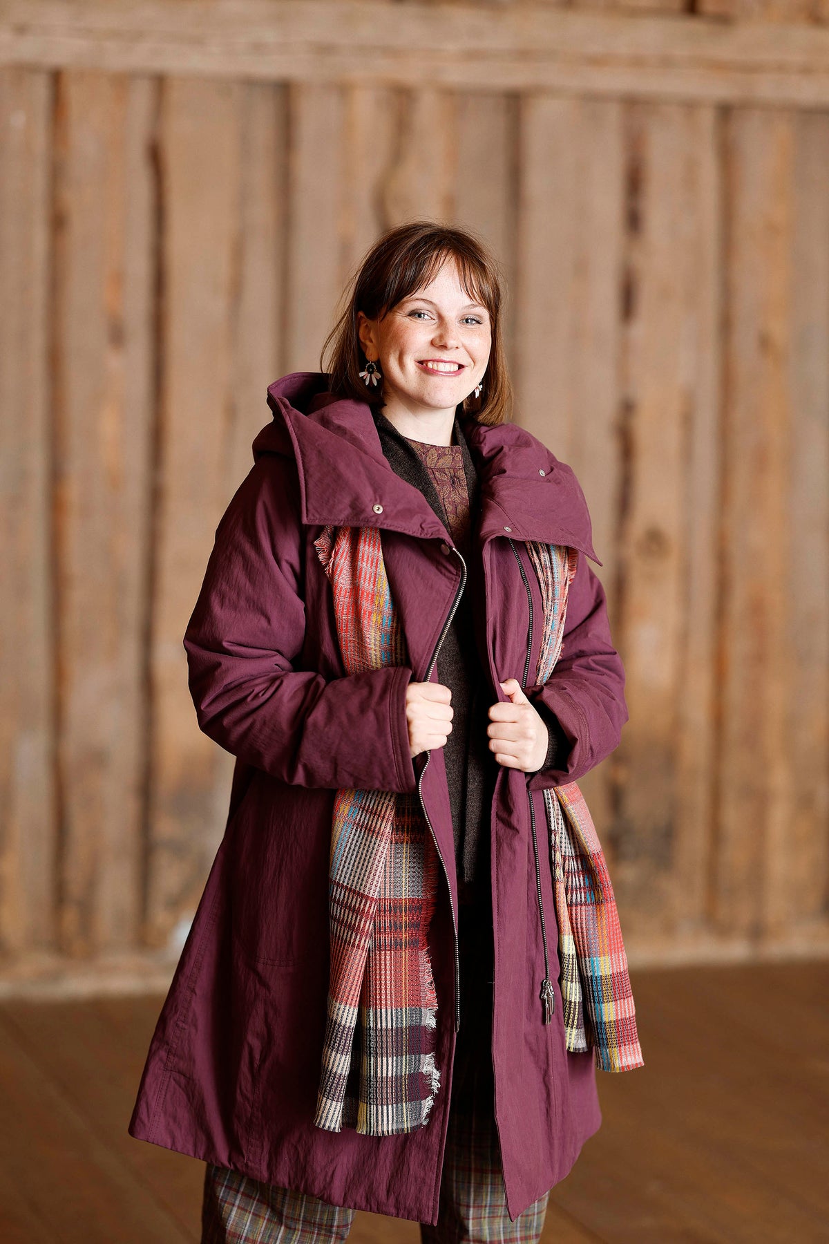 Plum coat with asymmetric zipper