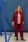 Red/pink long shirt with pleats at the back