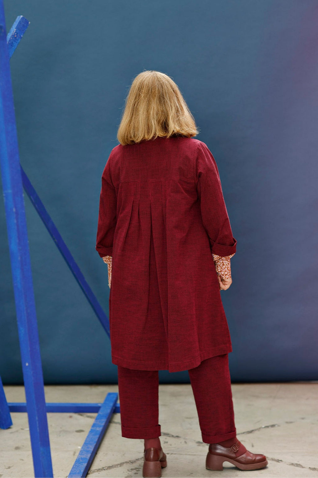 Red/pink long shirt with pleats at the back