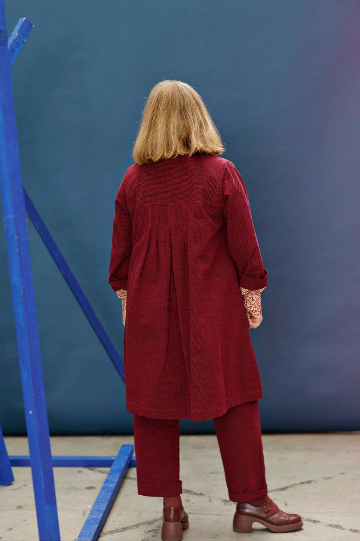 Red/pink long shirt with pleats at the back