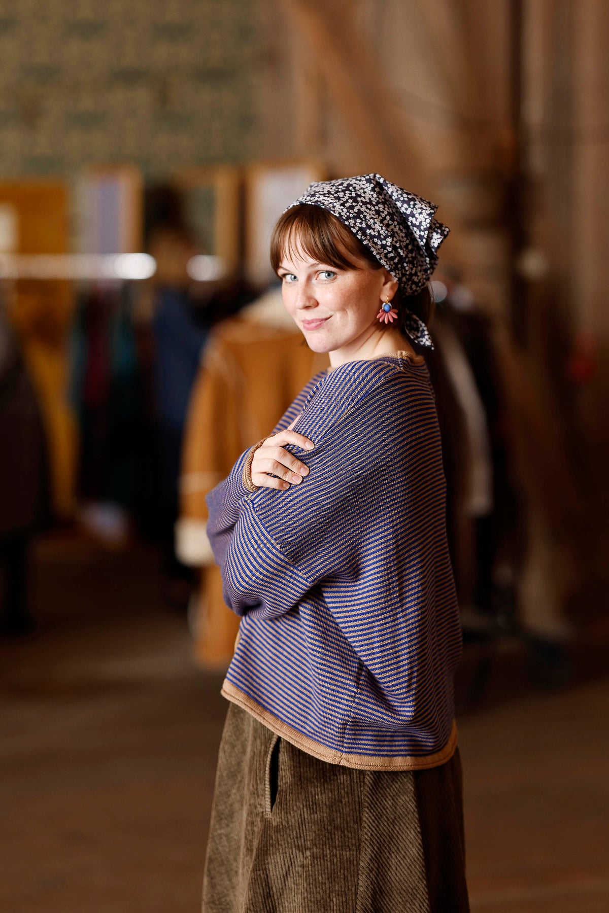 Long-sleeved knit from MUSE WEAR with narrow camel and blue stripes