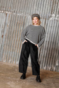 Long-sleeved knit from MUSE WEAR with narrow off-white and black stripes