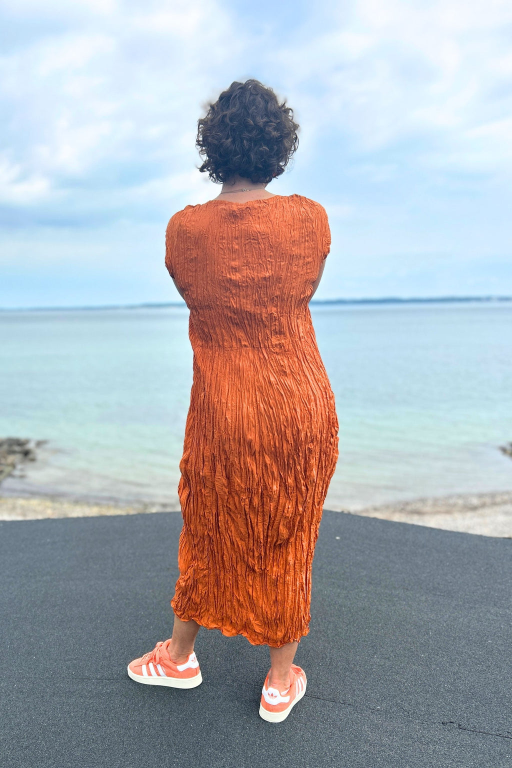 Orange-colored crinkled silk dress from Privatsachen