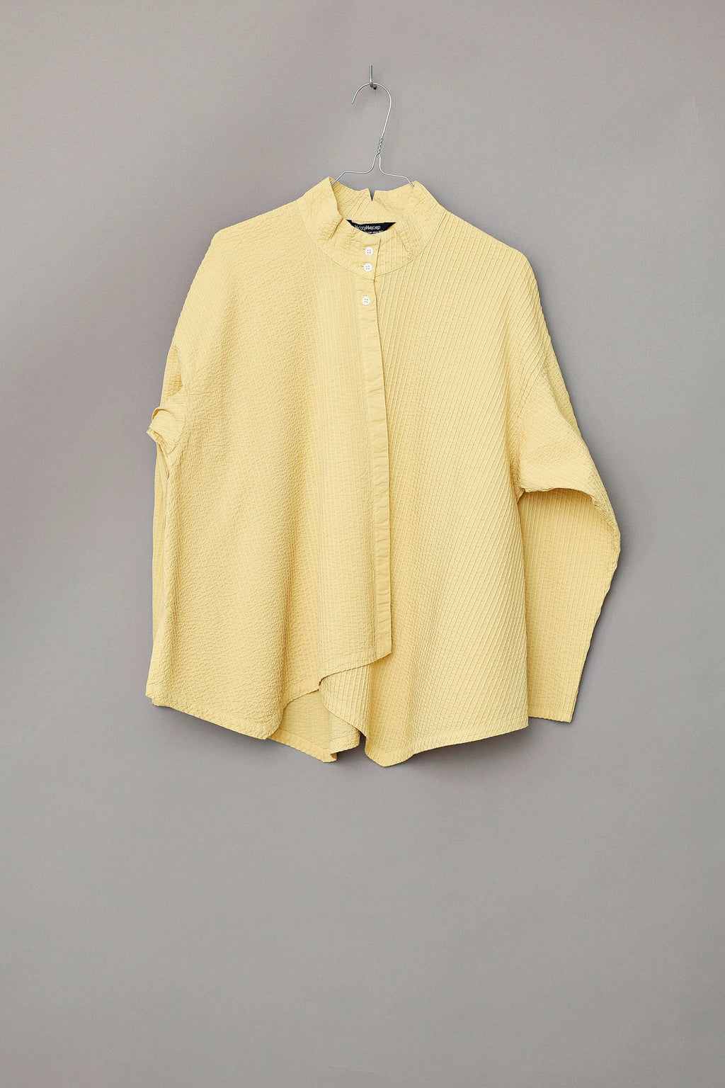 Yellow YaccoMaricard shirt with asymmetrical closure