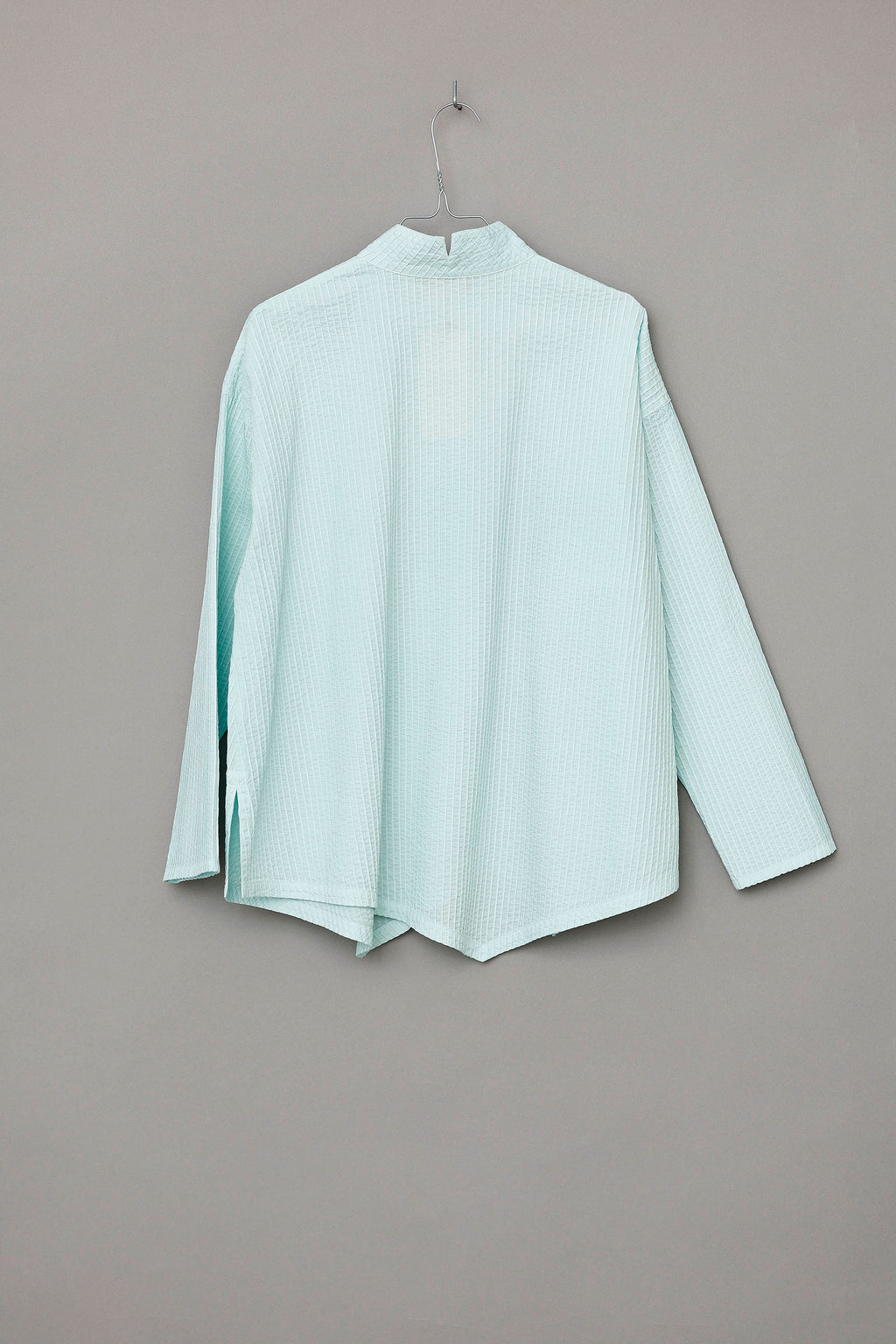 Fresh mint green YaccoMaricard shirt with asymmetrical button closure