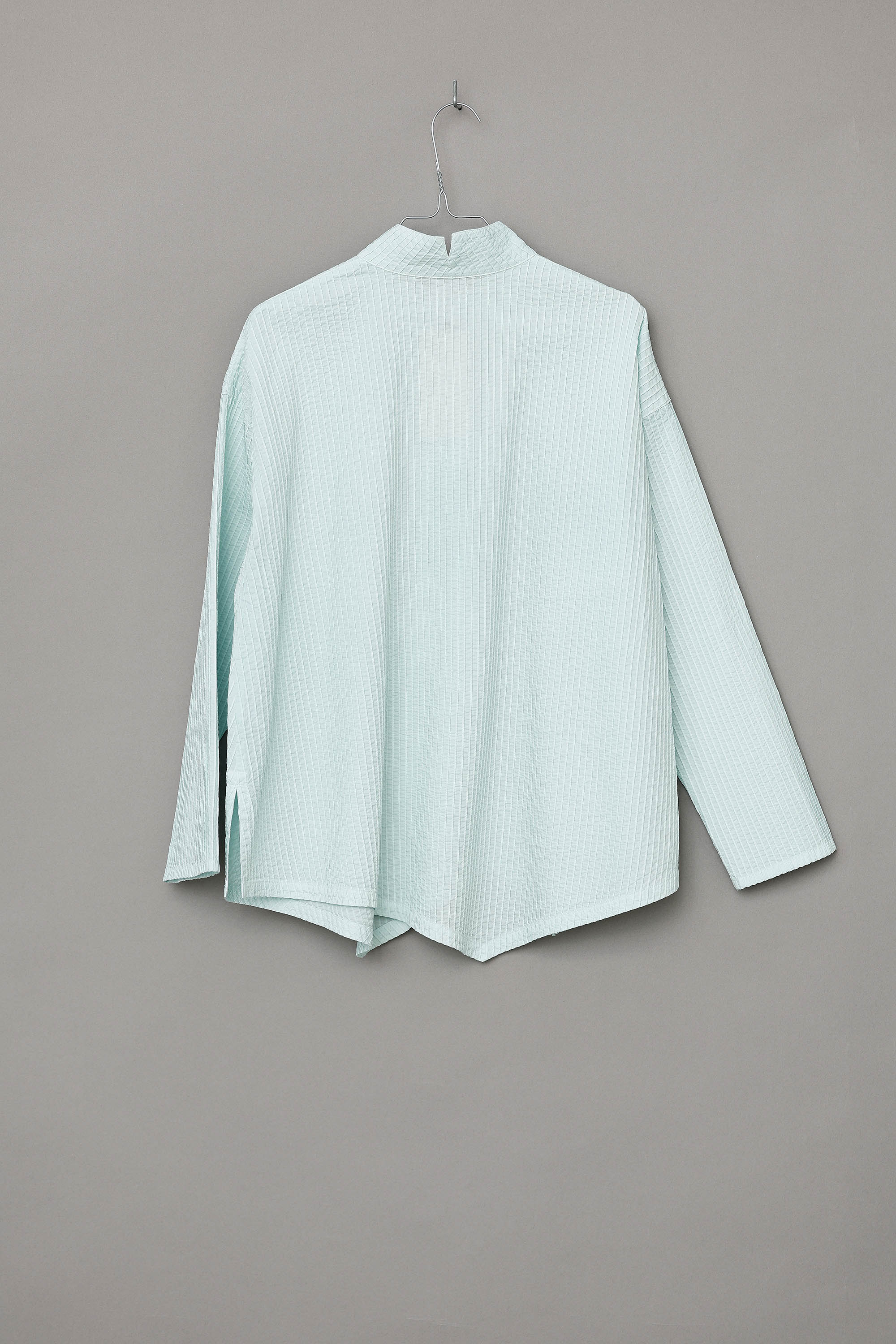 Fresh mint green YaccoMaricard shirt with asymmetrical button closure