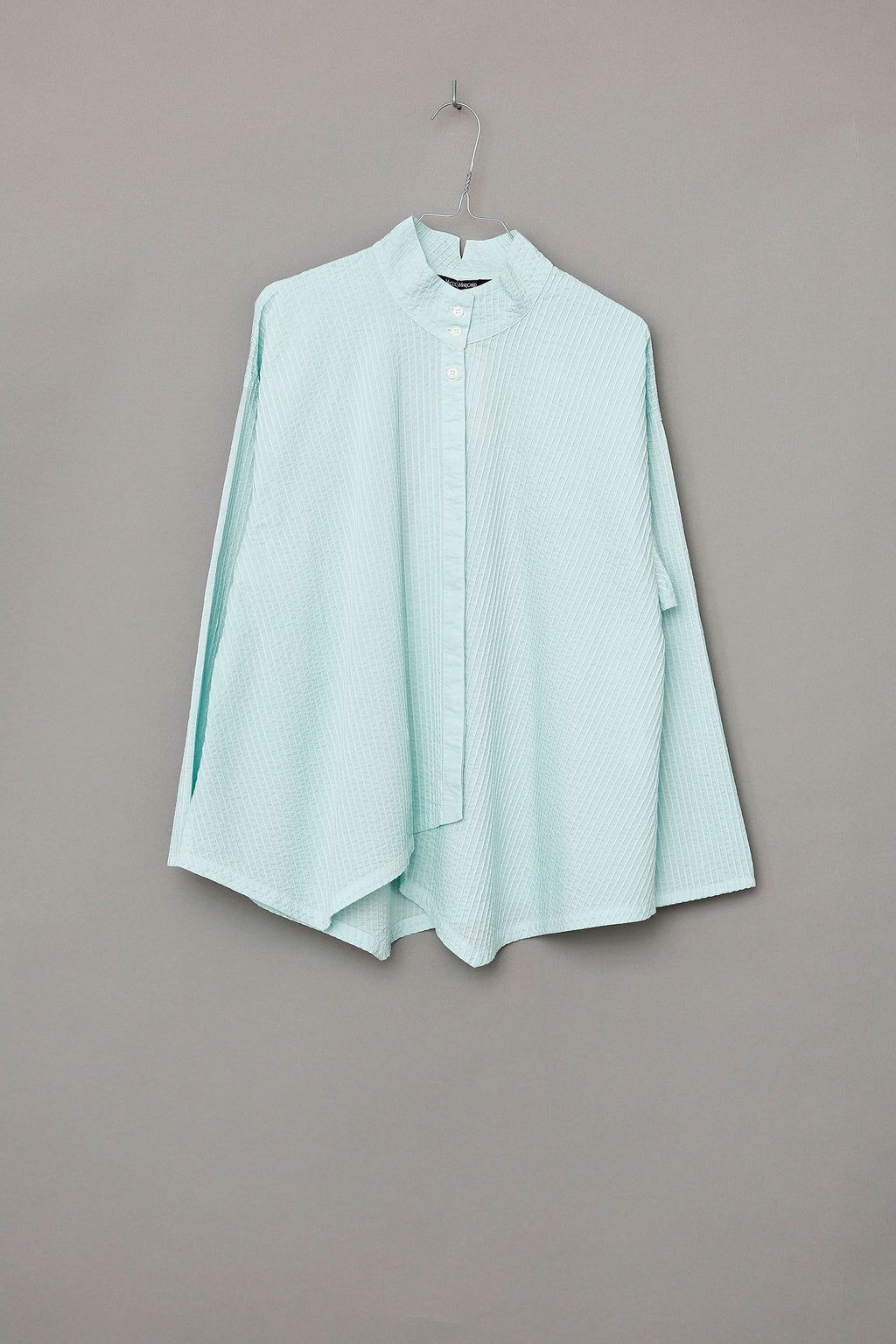 Fresh mint green YaccoMaricard shirt with asymmetrical button closure
