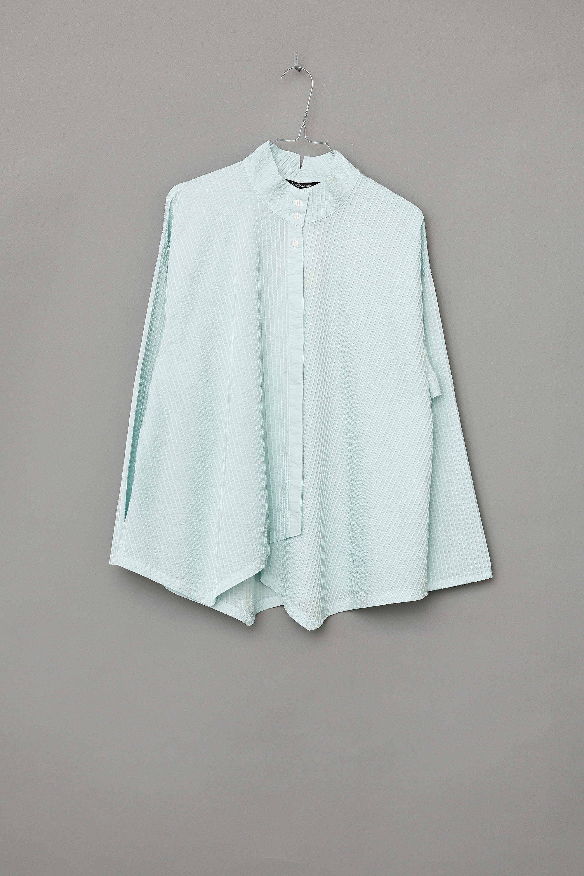Fresh mint green YaccoMaricard shirt with asymmetrical button closure