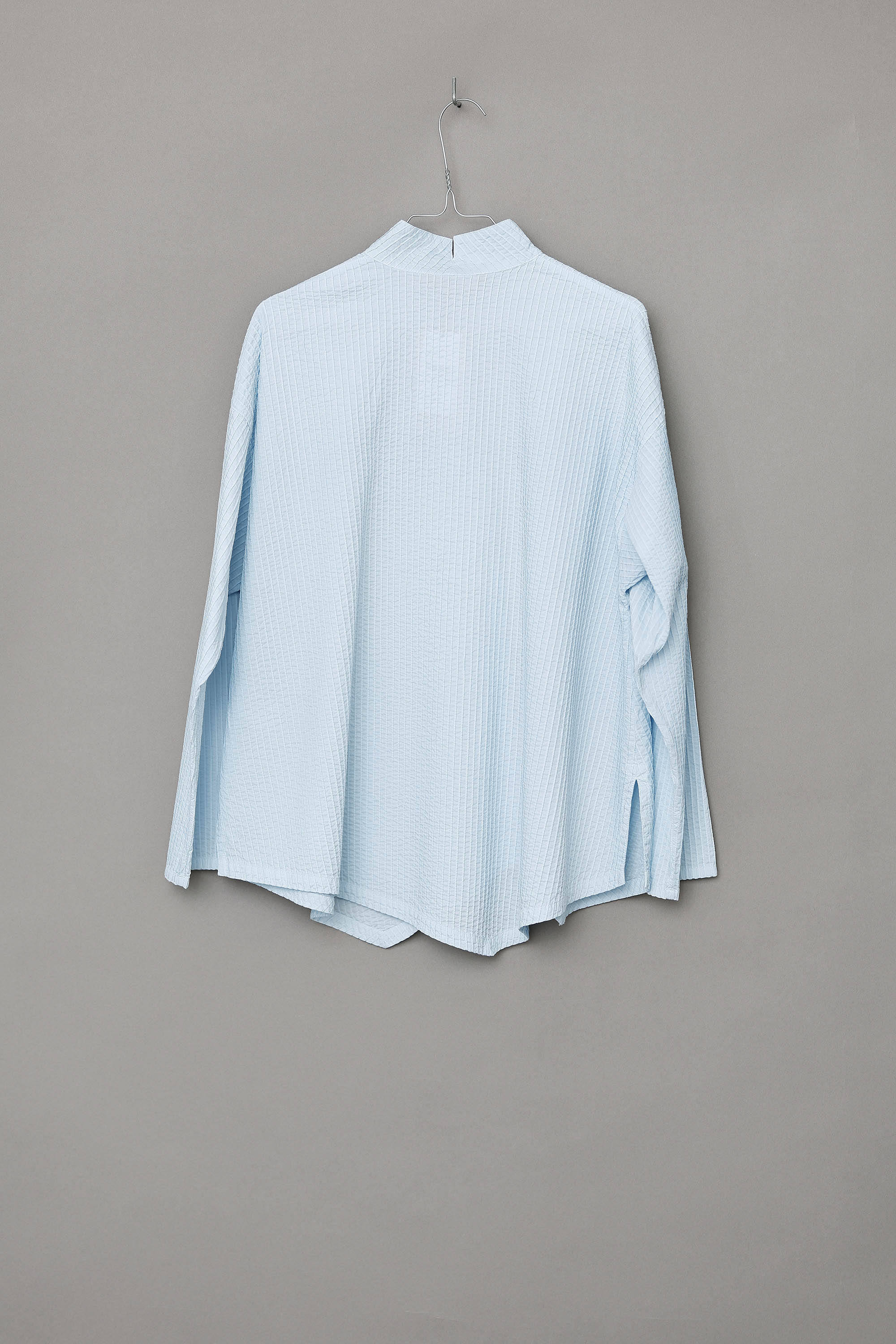Cool light blue YaccoMaricard shirt with asymmetrical closure