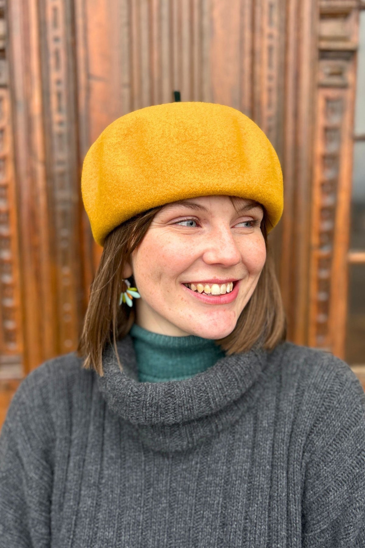 Roll Up Baret hat from Kopka in Yellow & emerald