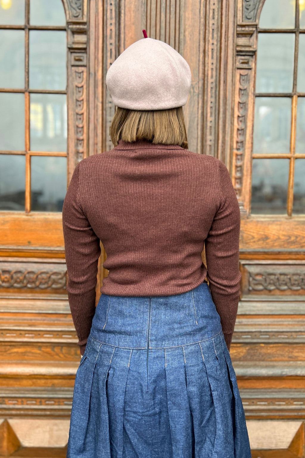 Brown high-necked sweater`