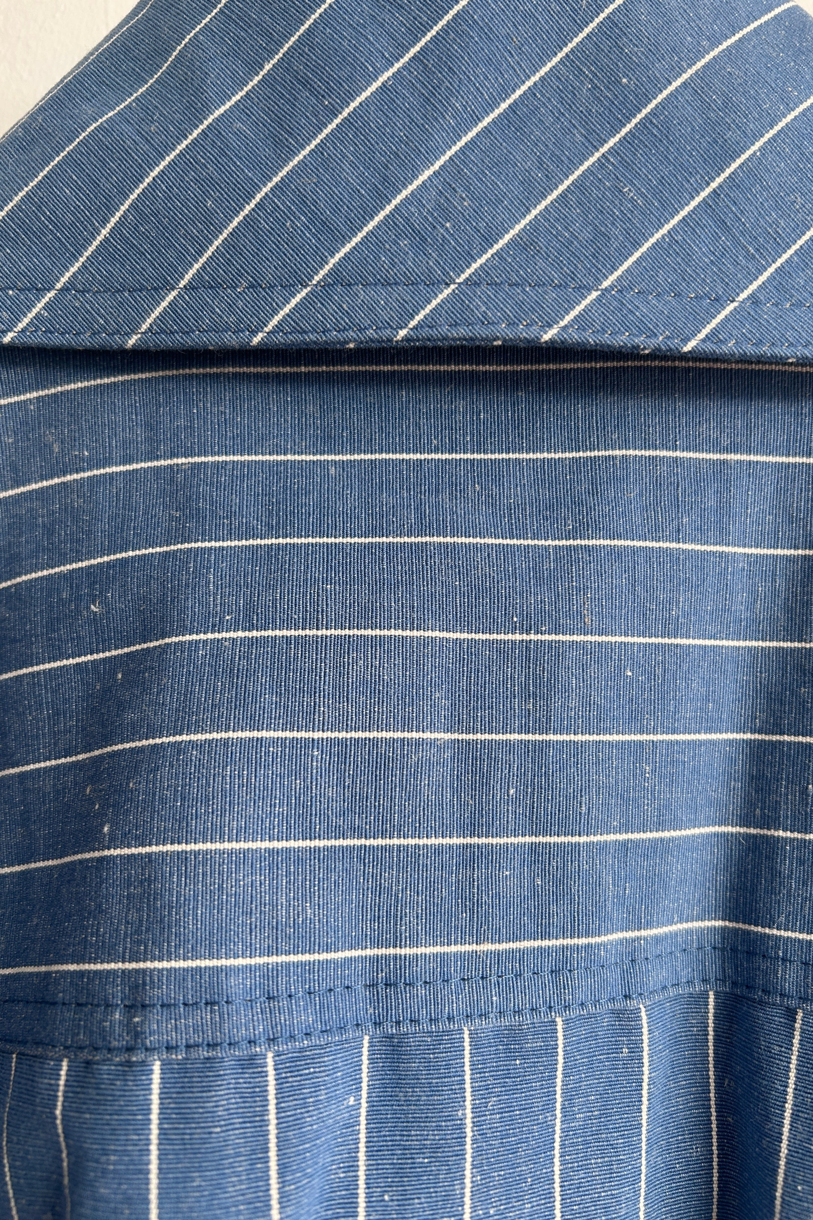 Cool, striped spring coat in blue linen/cotton quality
