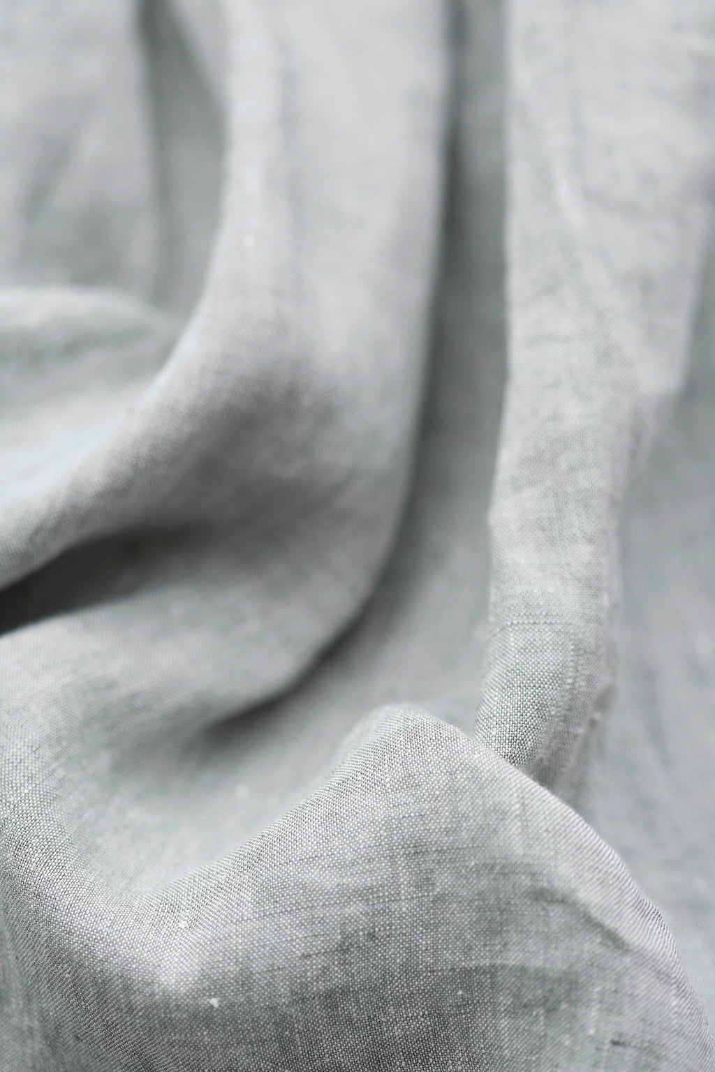 Light blue linen trousers with elastic waistband