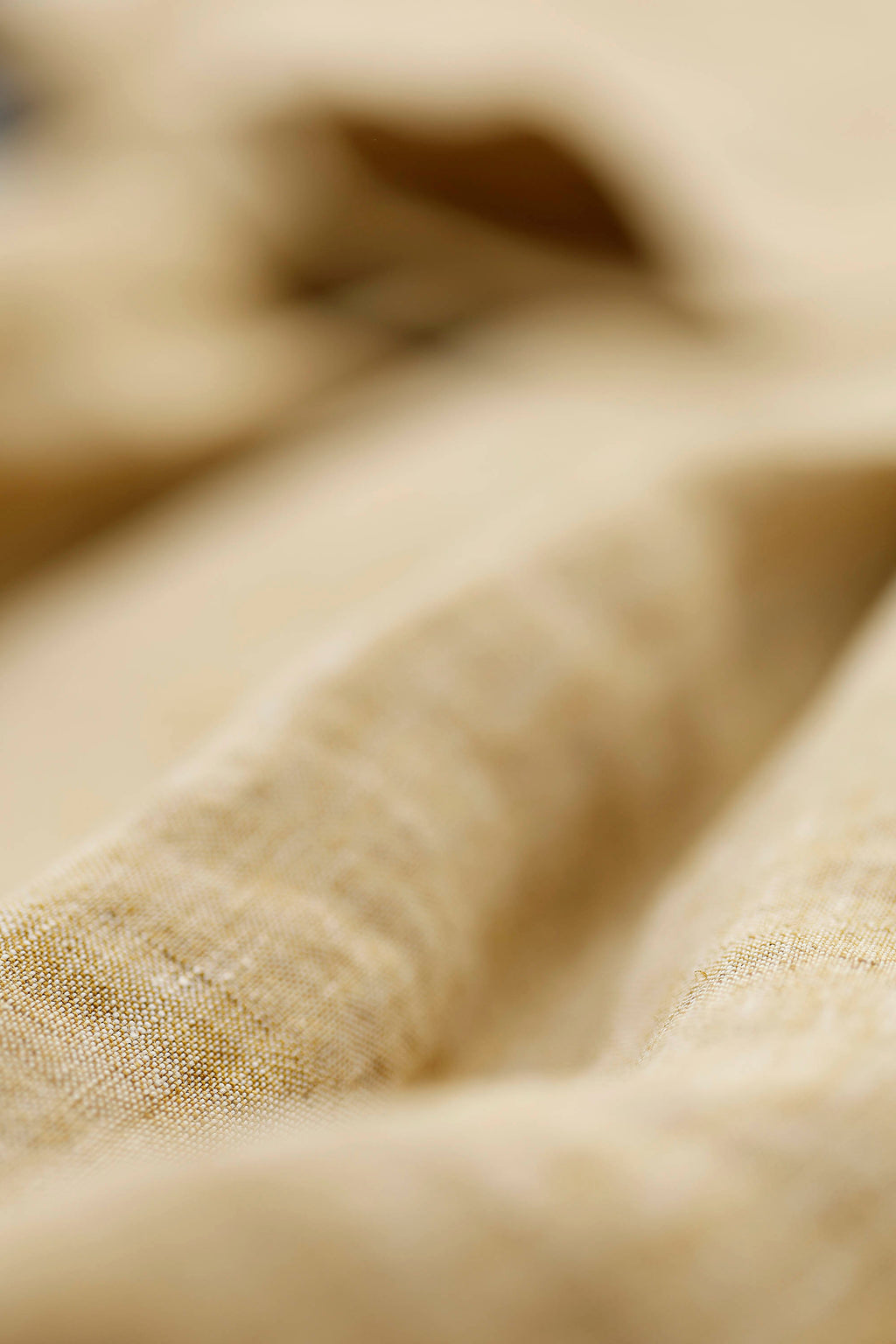 Pale yellow linen trousers with elastic waistband