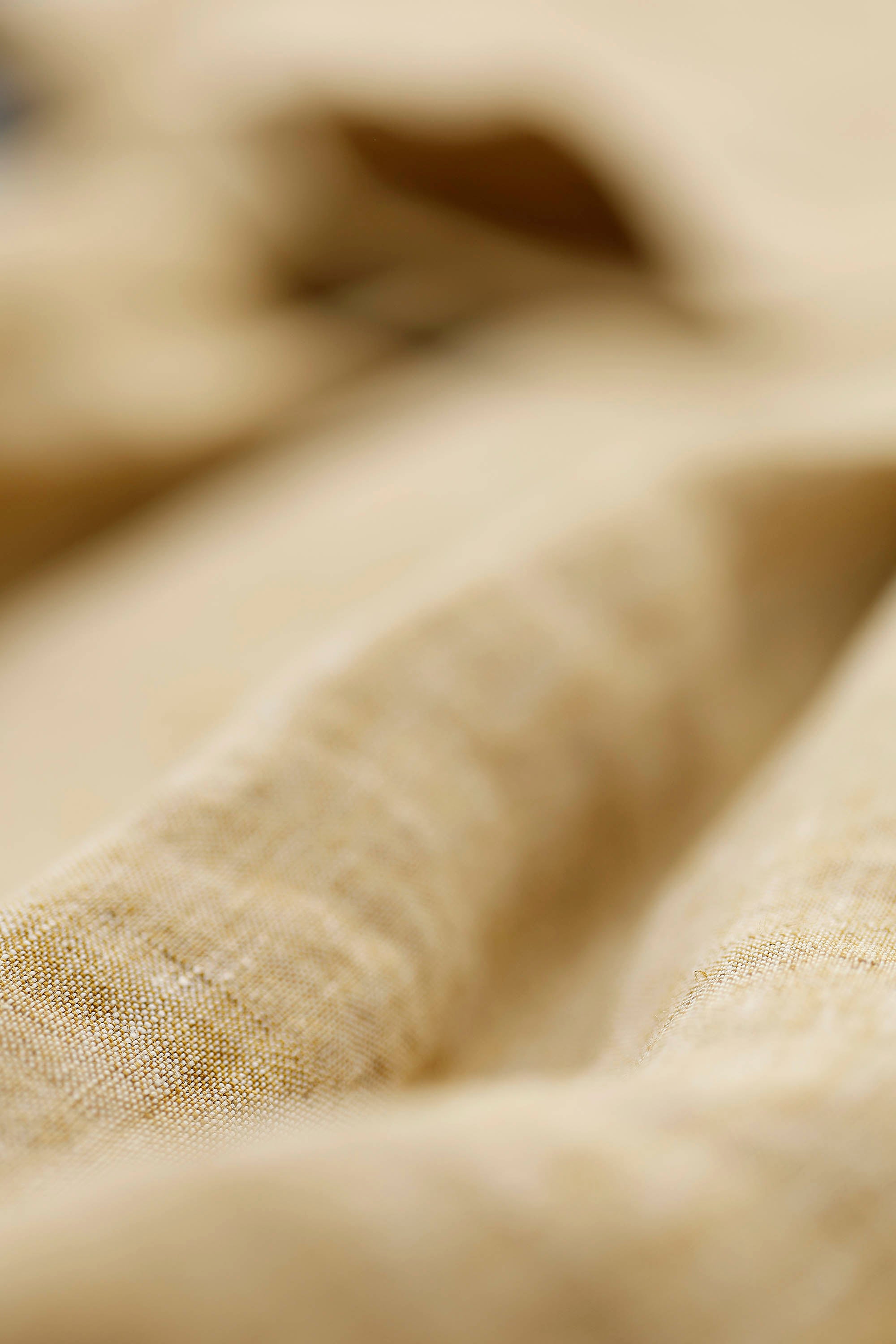 Pale yellow linen trousers with elastic waistband