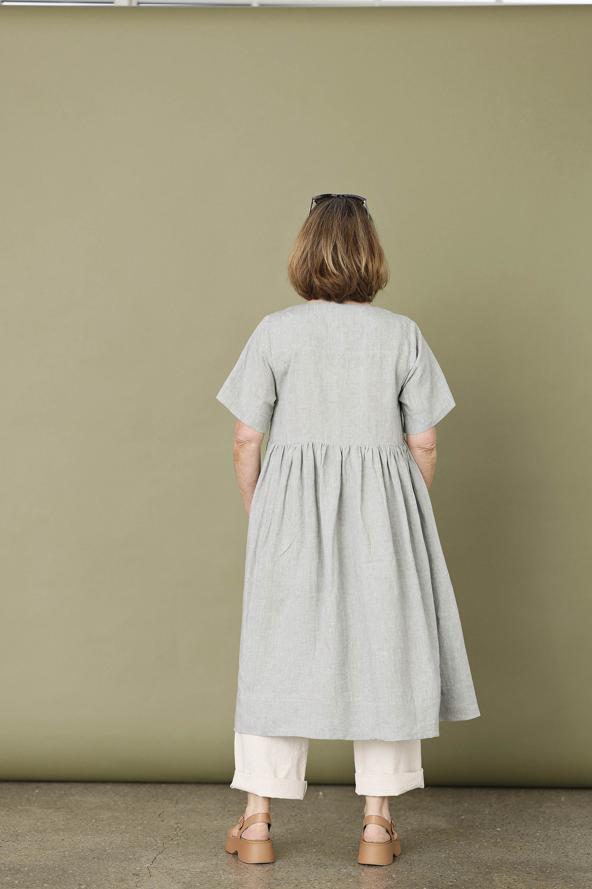 Lovely light blue linen dress with buttons.