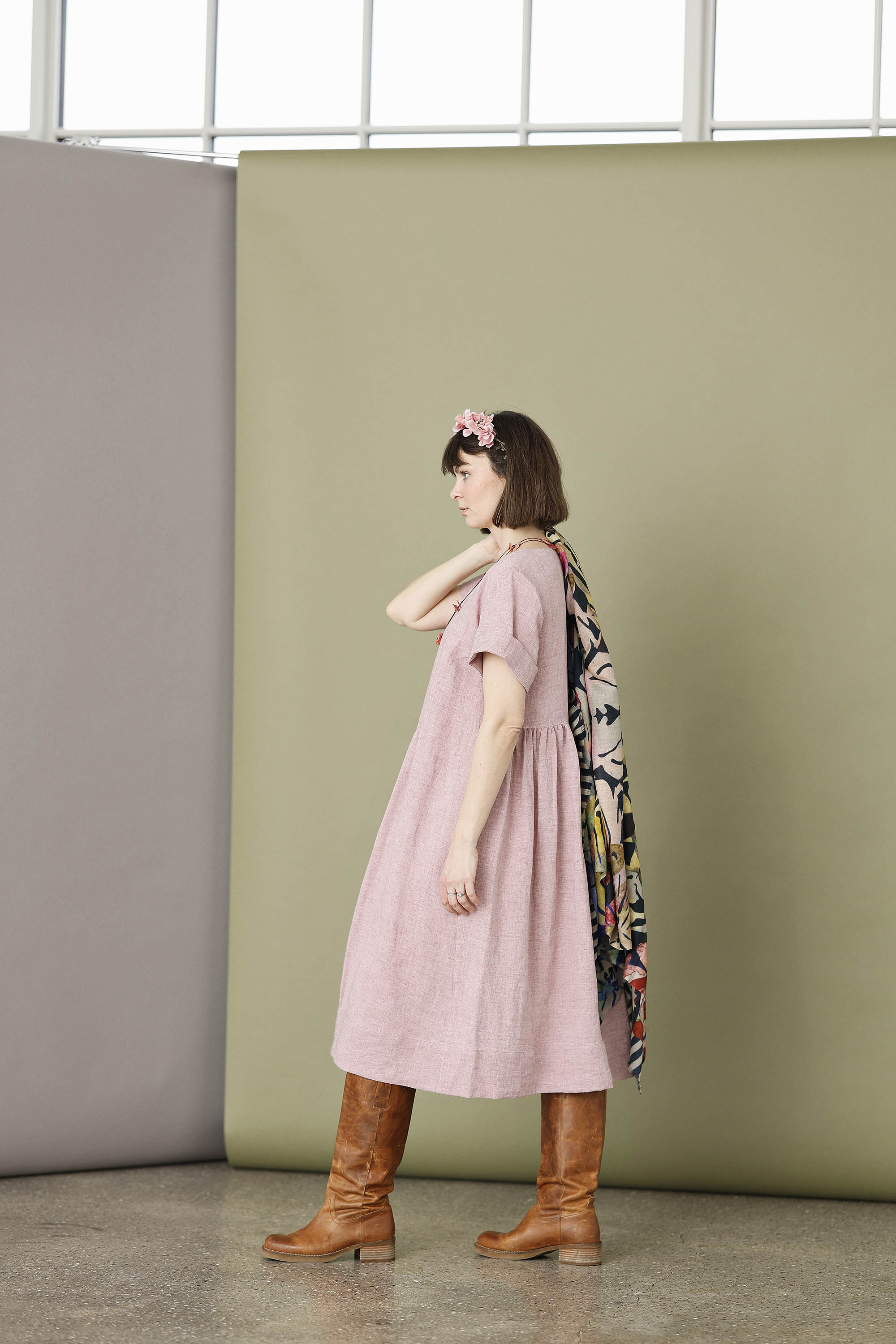 Feminine rose colour linen dress with buttons.