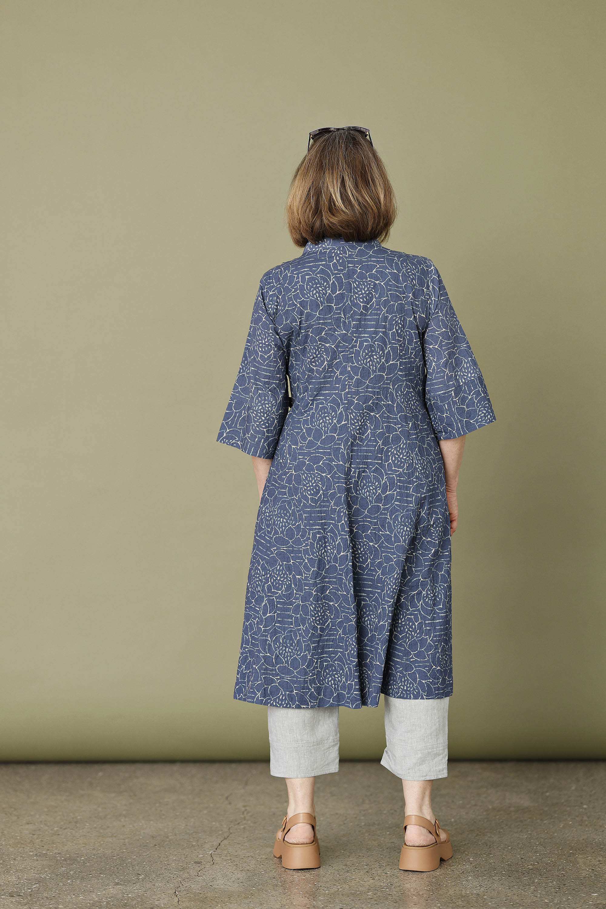 Blue wrap dress with "lotus" print