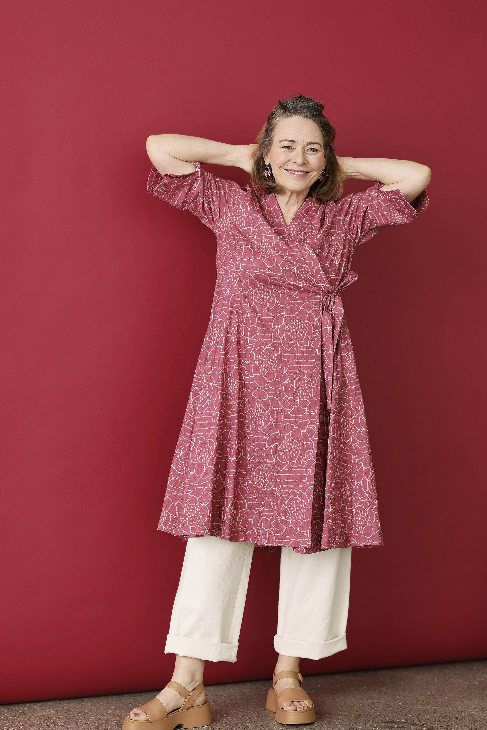 Raspberry red wrap dress with "lotus" print