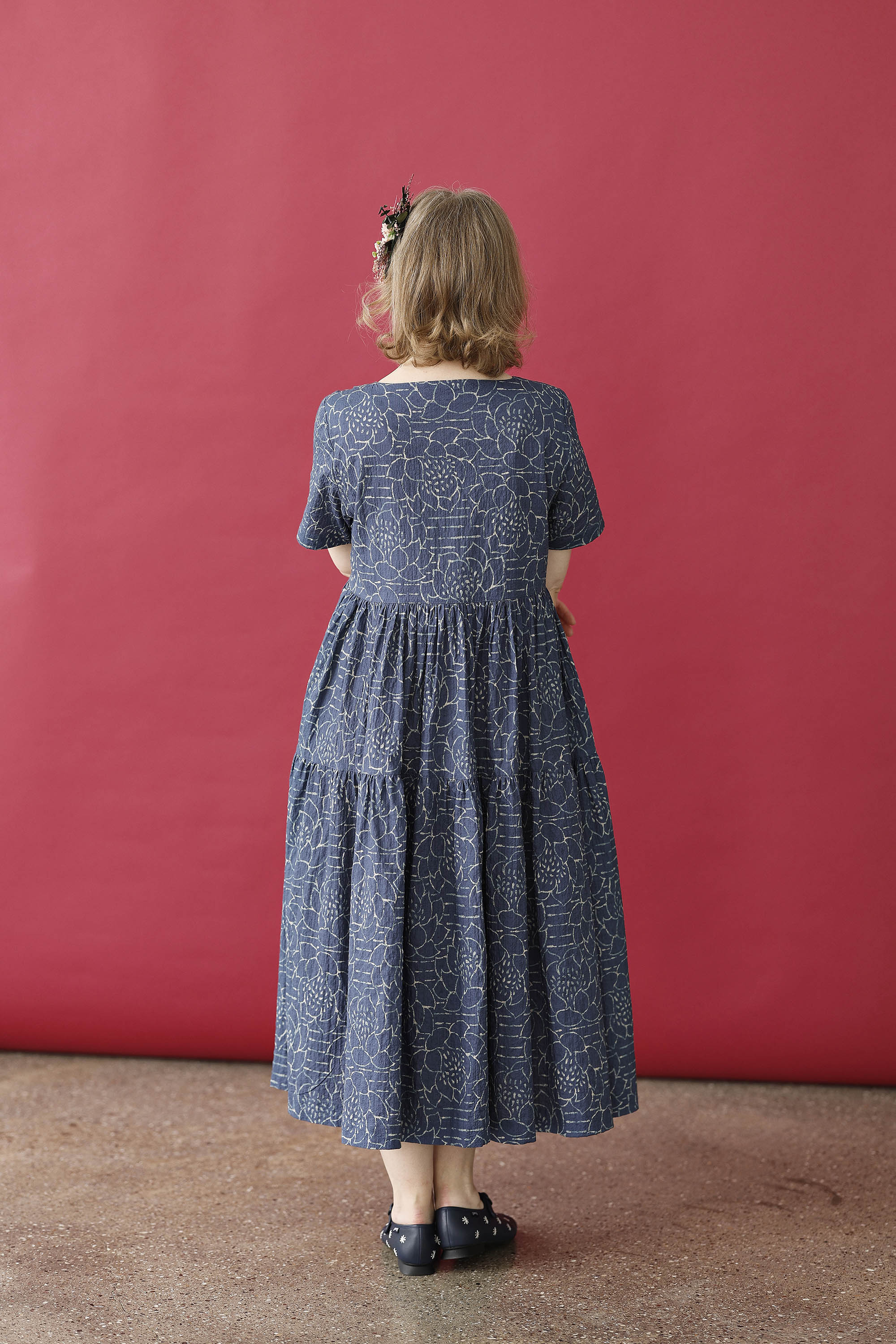 Blue feminine dress with "lotus" print