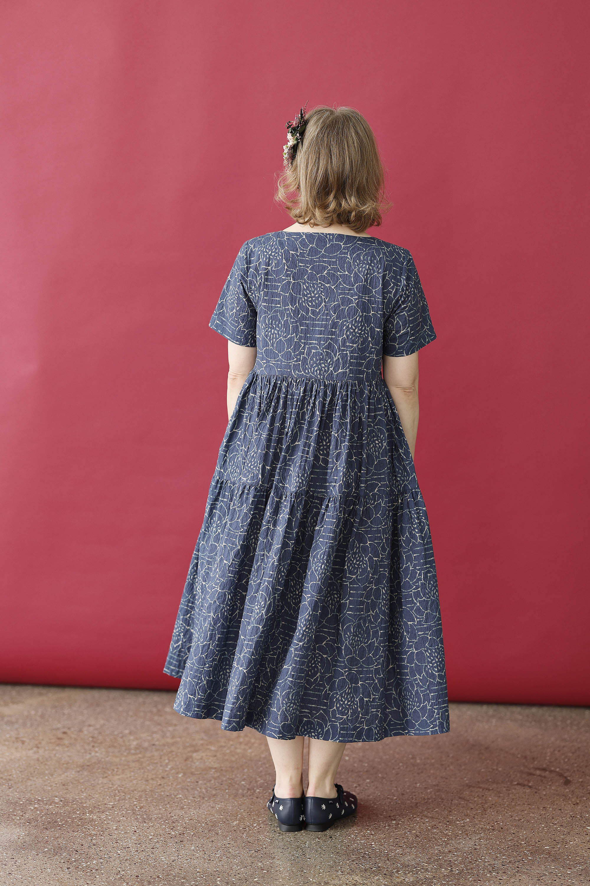 Blue feminine dress with "lotus" print