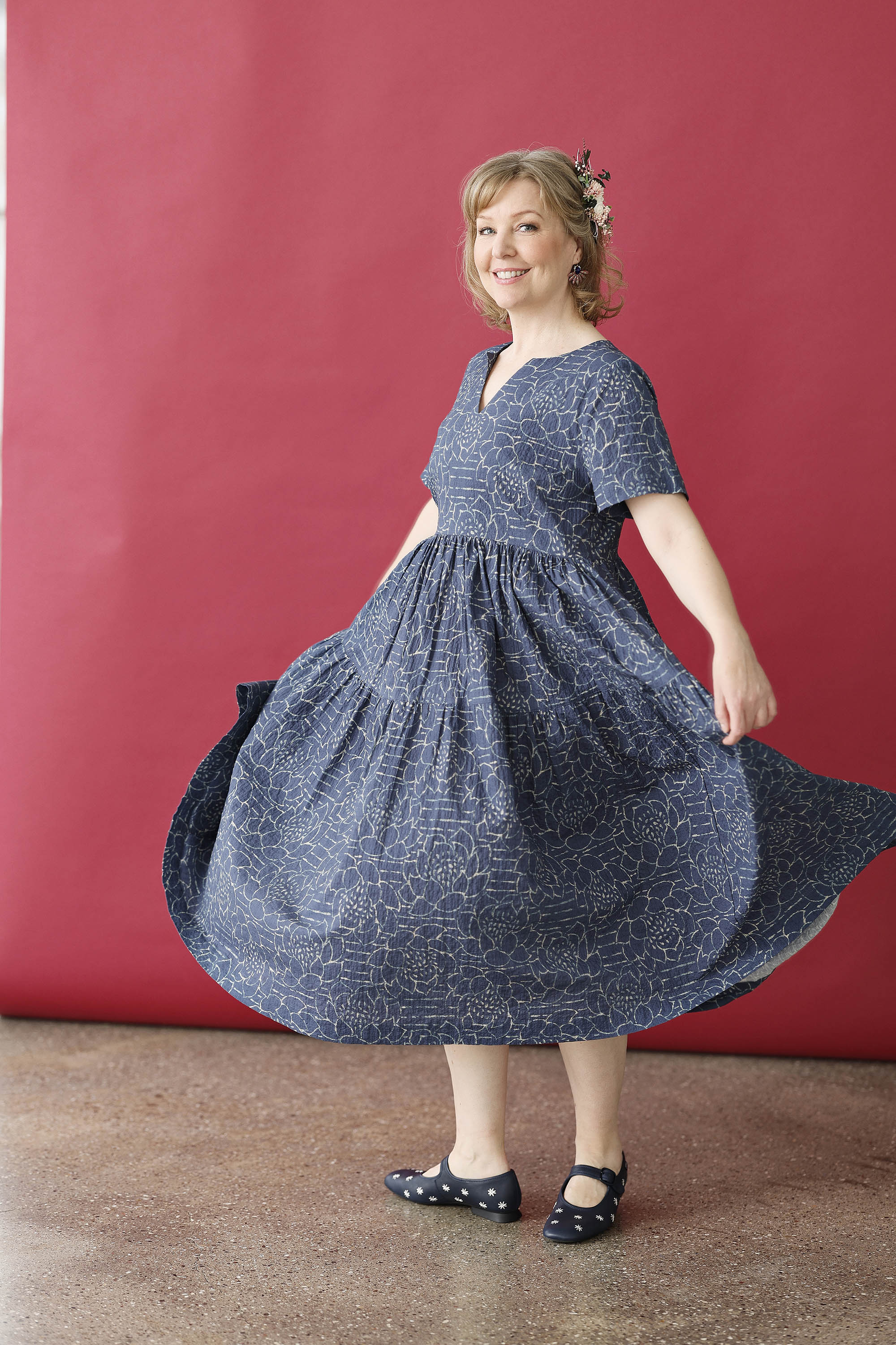 Blue feminine dress with "lotus" print