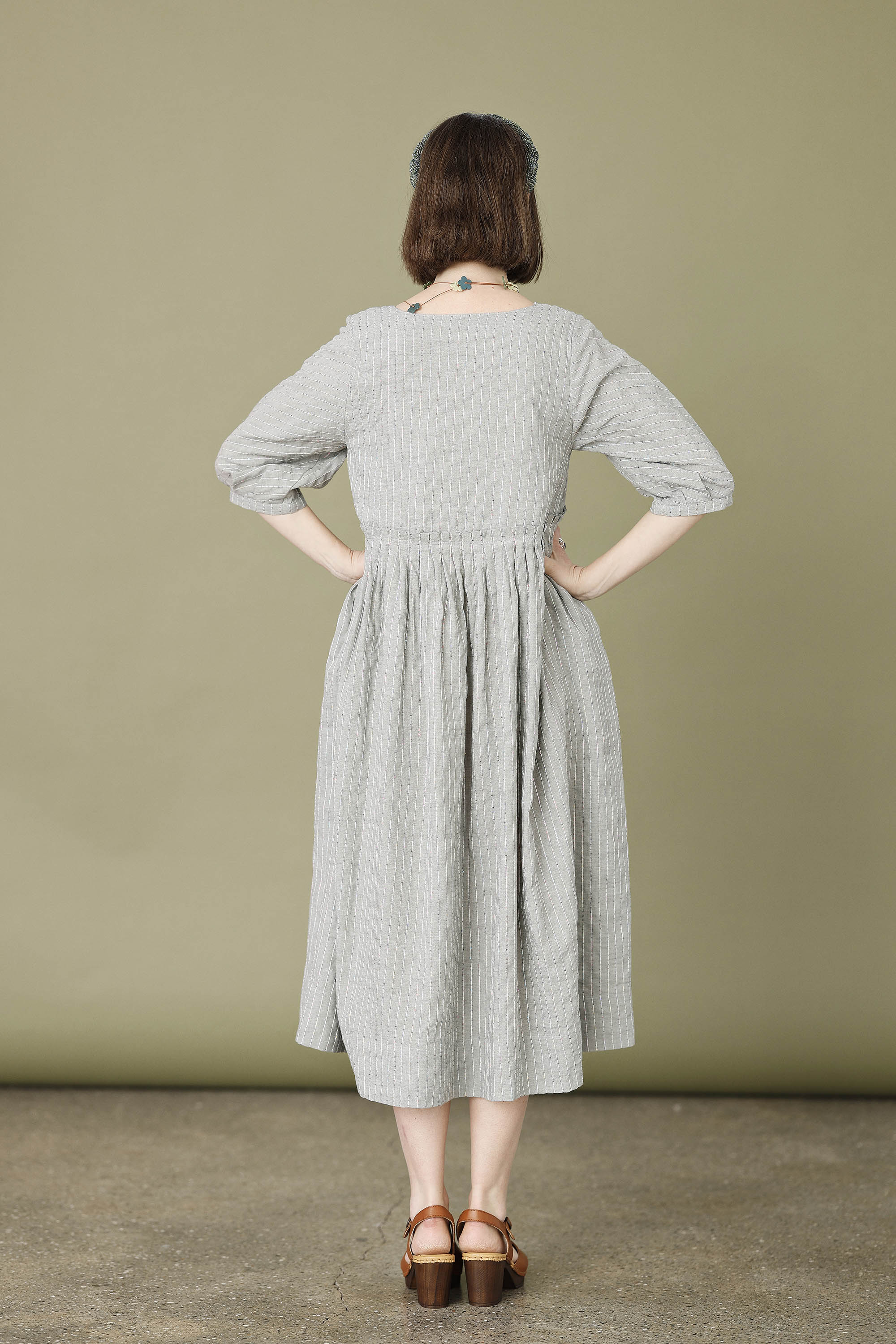 Feminine dress in light blue linen/cotton with sequins