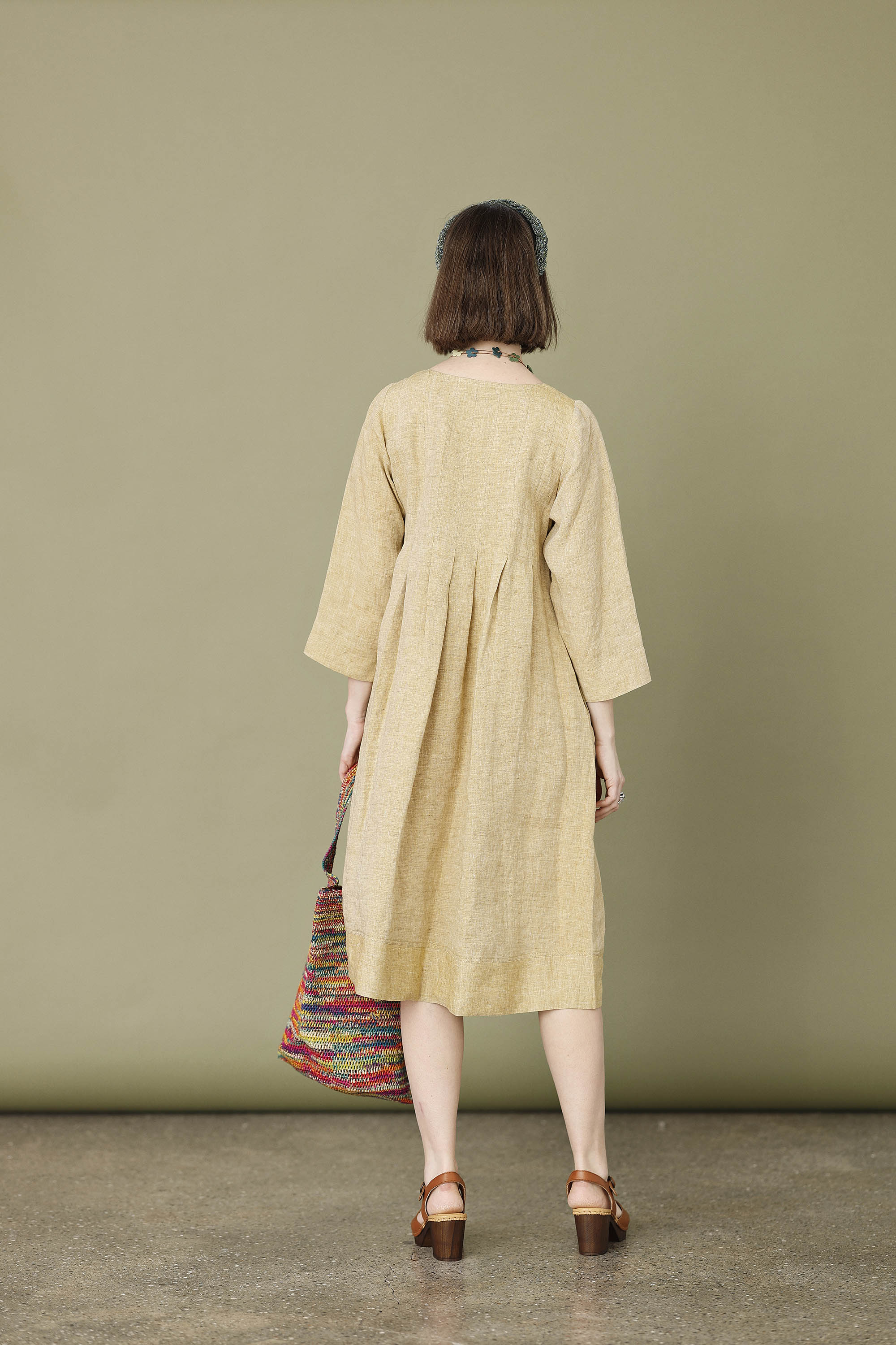 Pale yellow linen dress with pleats