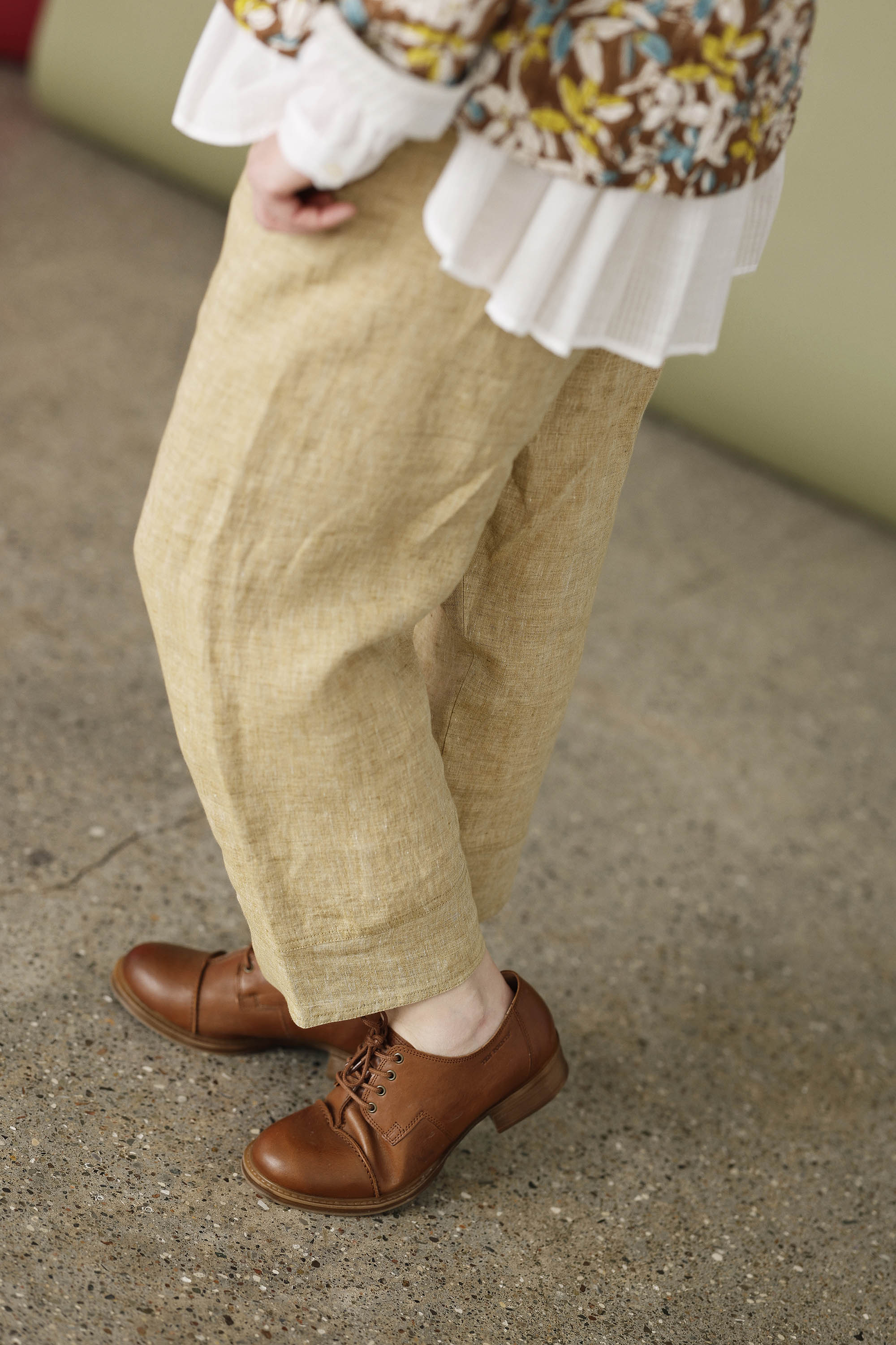 Pale yellow linen trousers with elastic waistband