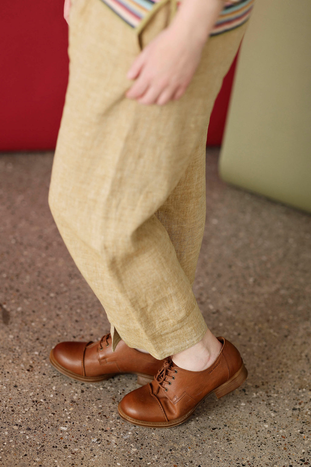 Pale yellow linen trousers with elastic waistband