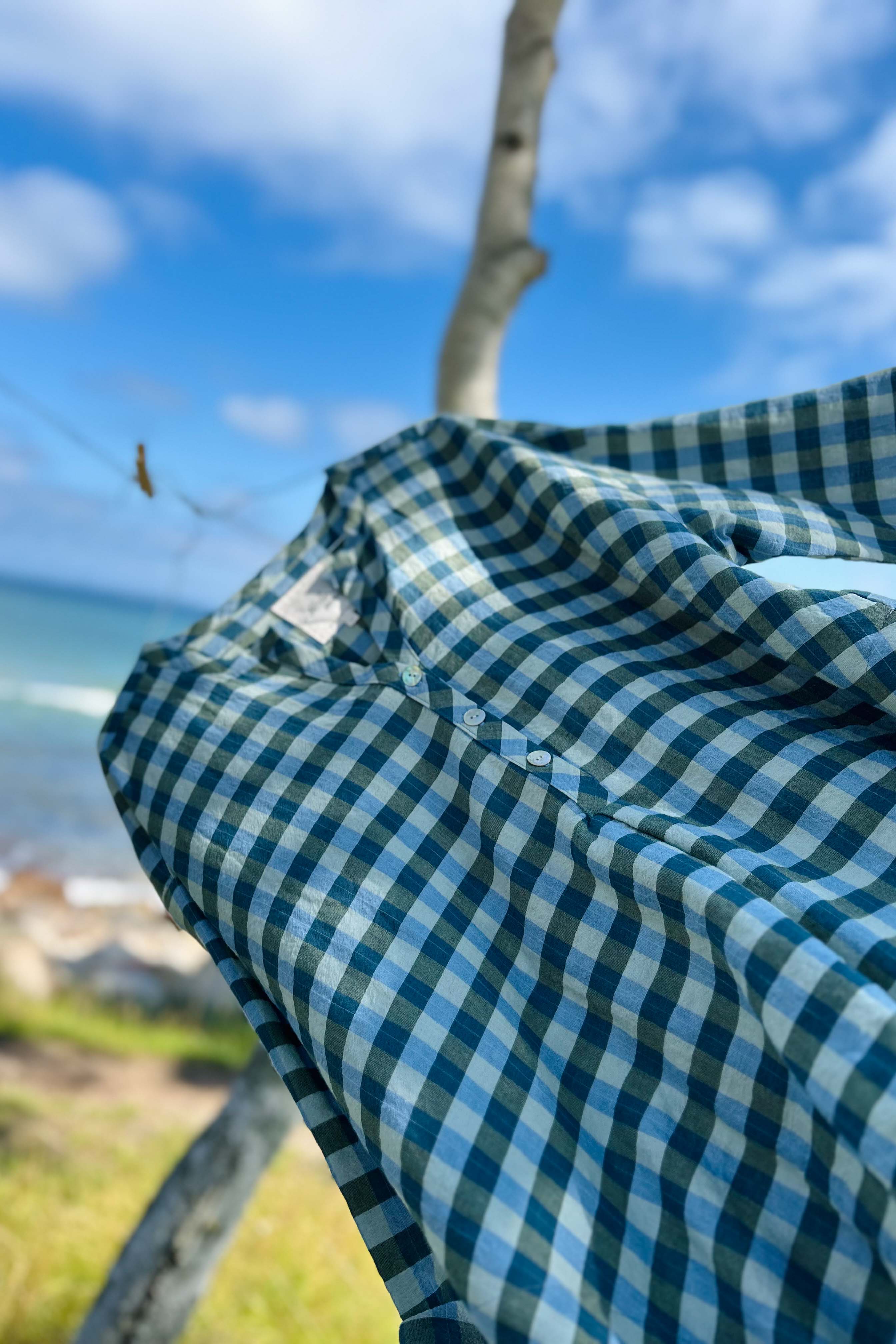 Løs ternet kjole i blå/grønne nuancer