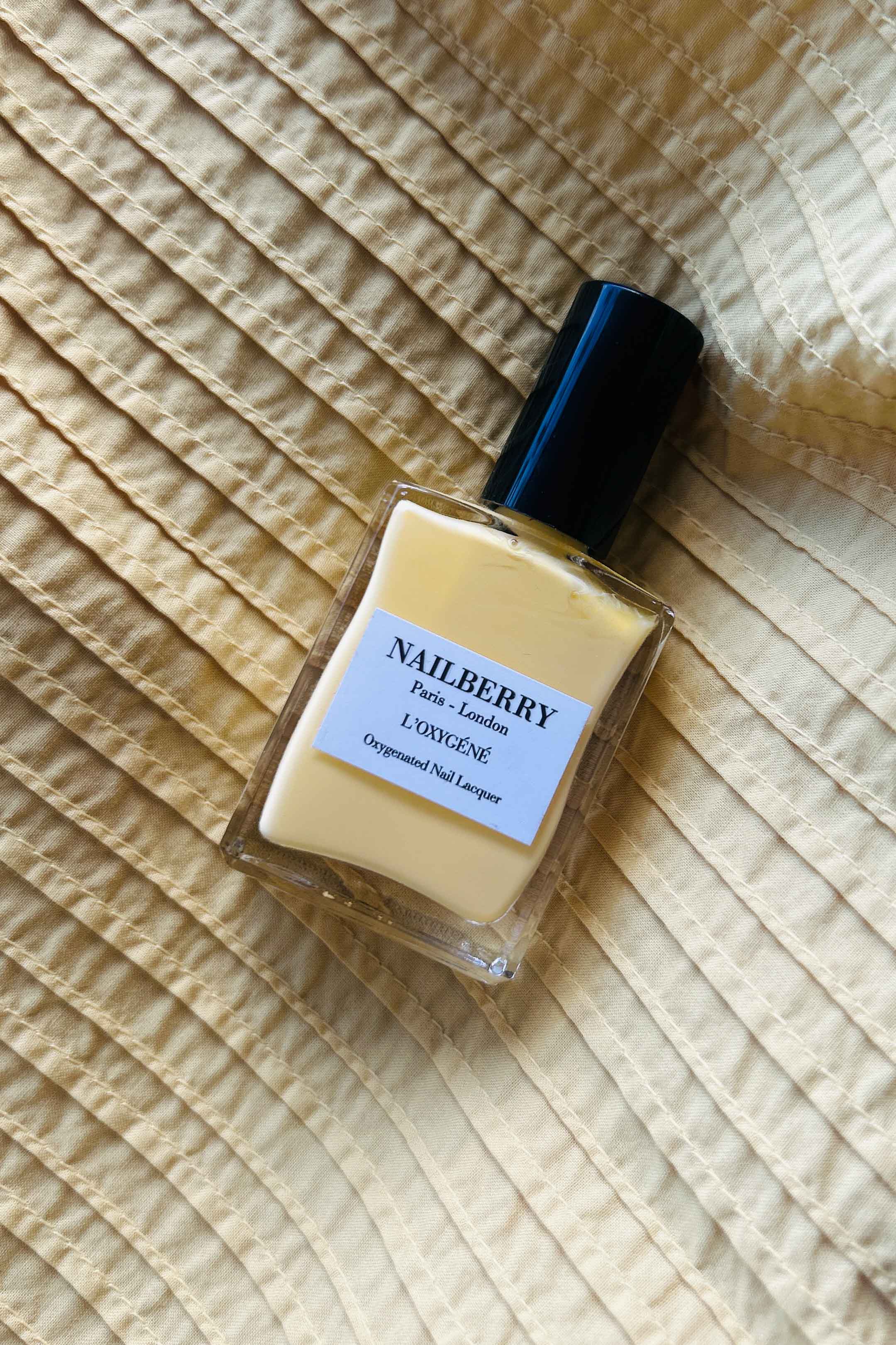 Vibrant yellow nail polish from Nailberry