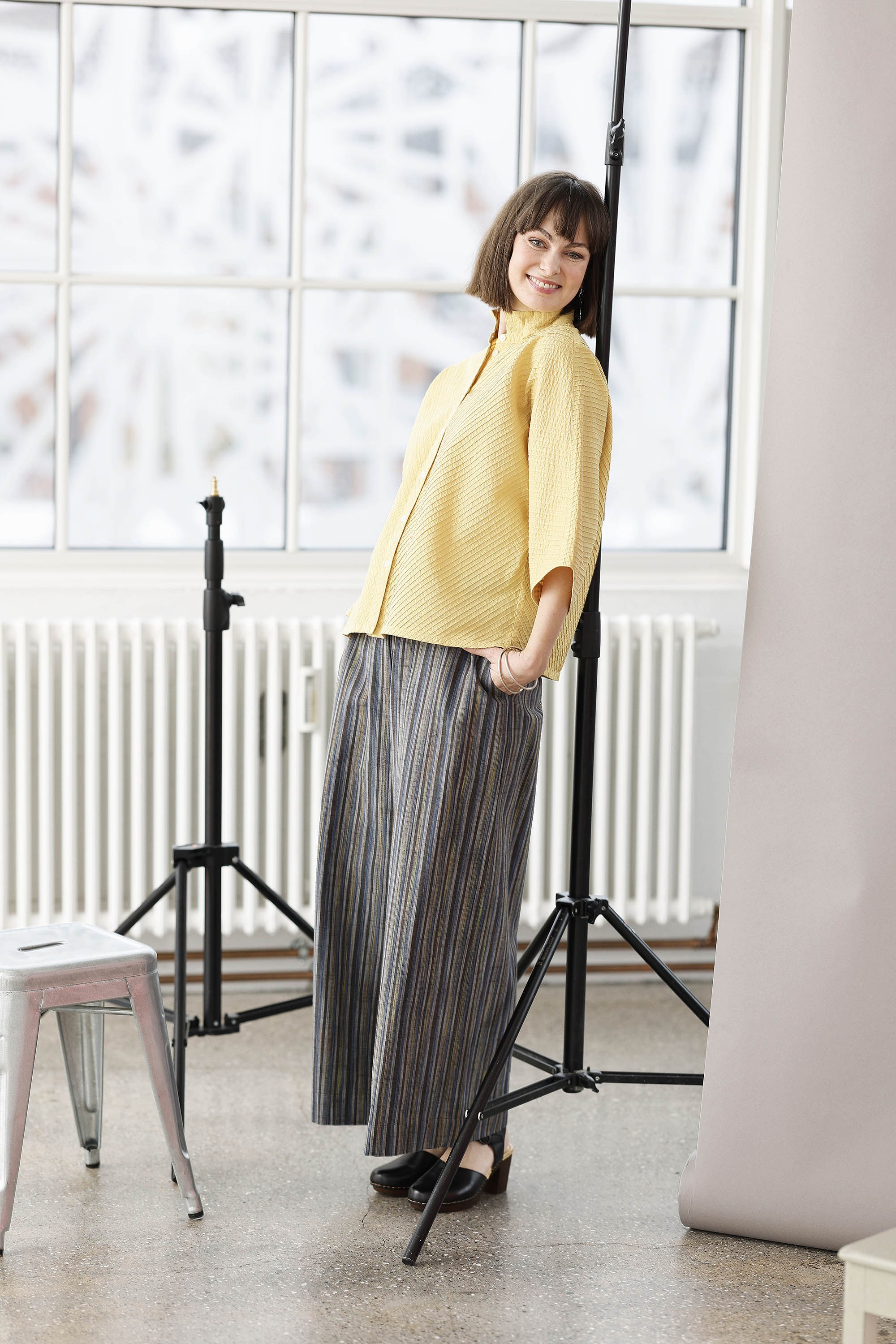 Yellow YaccoMaricard shirt with batwing sleeves.