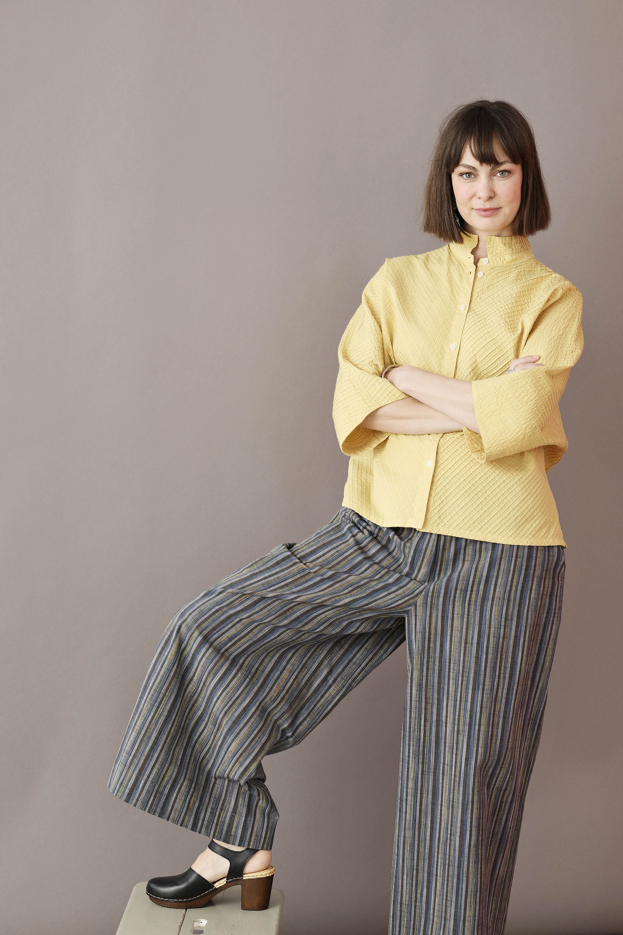 Yellow YaccoMaricard shirt with batwing sleeves.